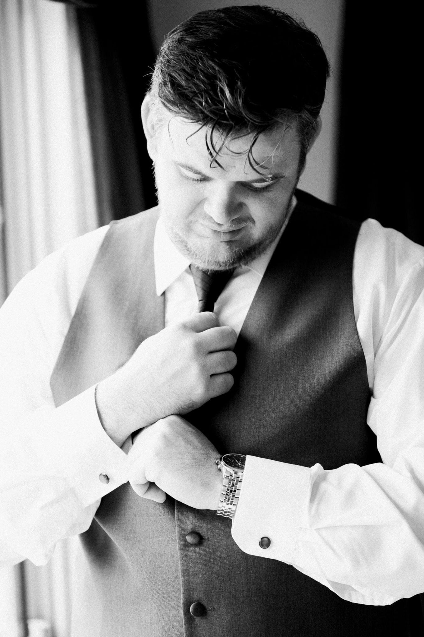 Groom during morning prep in b/w | Vancouver wedding photographer