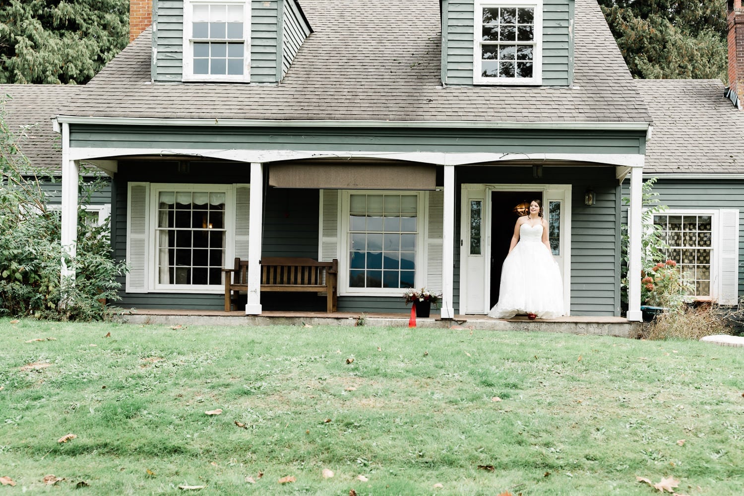Bride posing on the porch | Vancouver wedding photographer