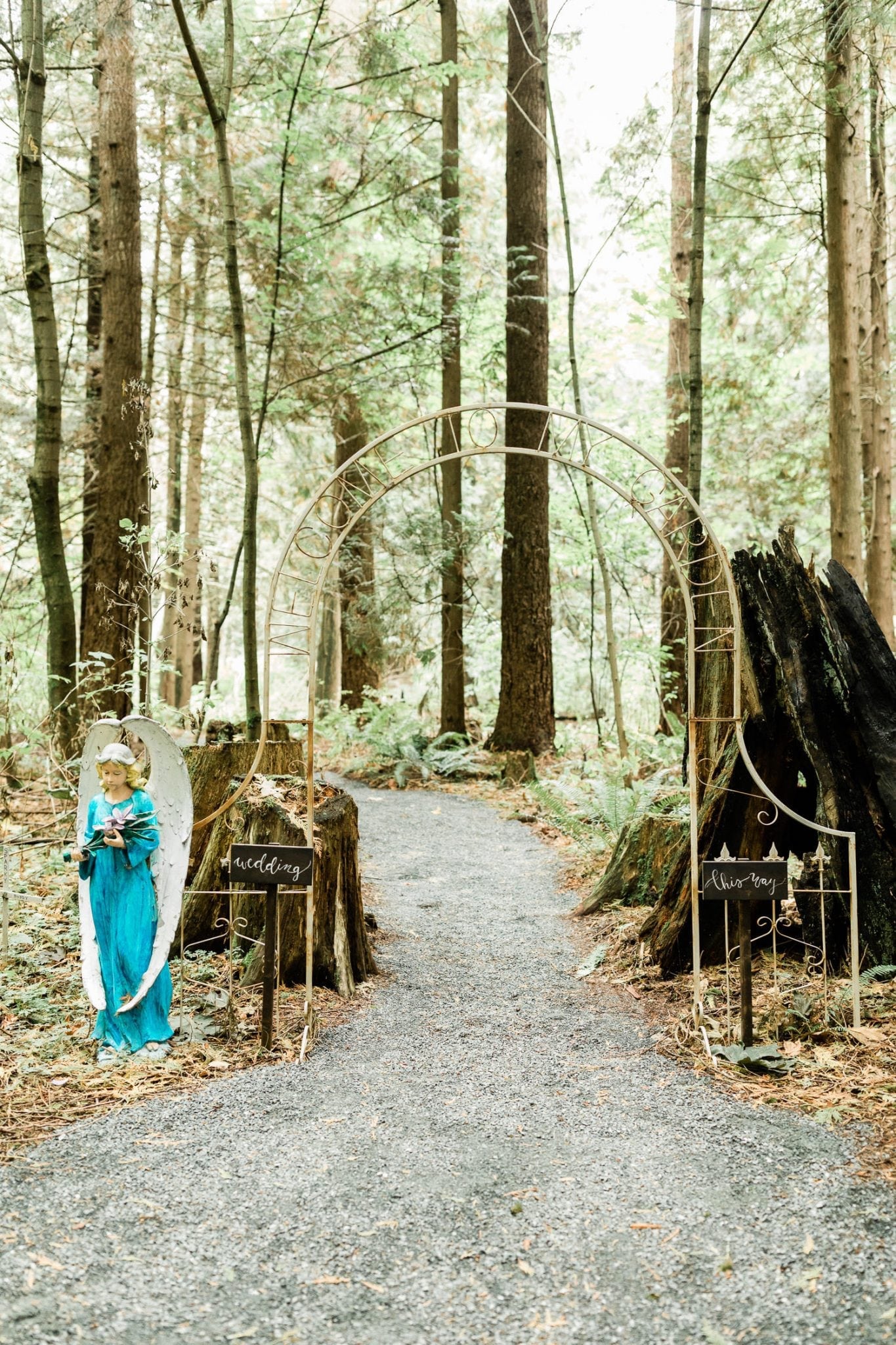 Rustic arch decoration in the woods | Vancouver wedding photographer