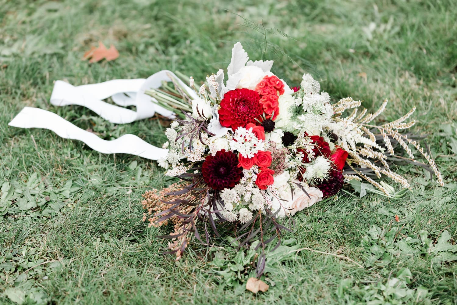 Wedding bouquet on the grass | Vancouver wedding photographer
