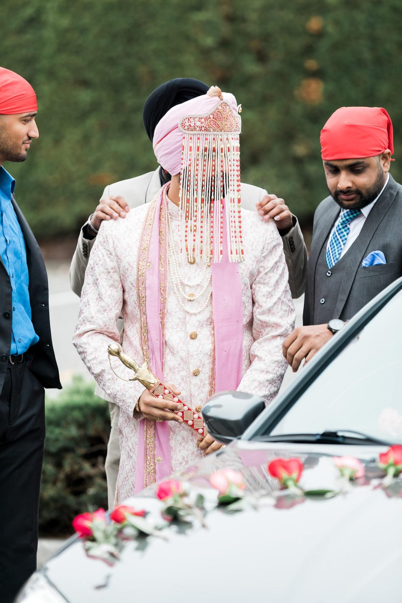 Indian groom before the temple entrance | Indian wedding photography Vancouver