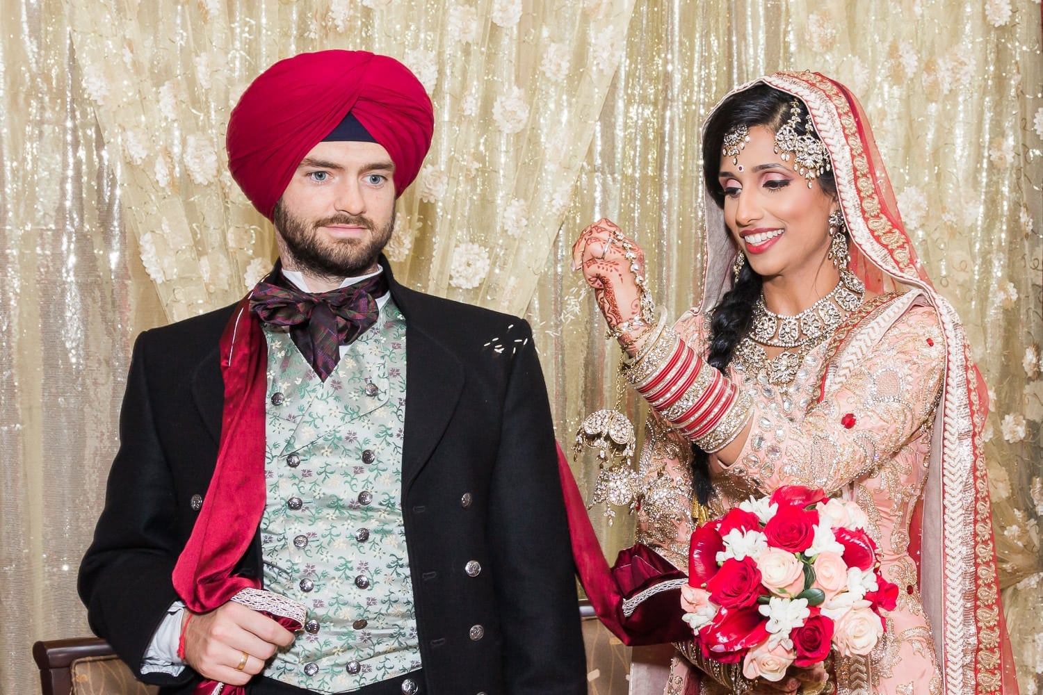 Indian bride throwing rice, Indian and Norwegian wedding | Vancouver Indian wedding photographer